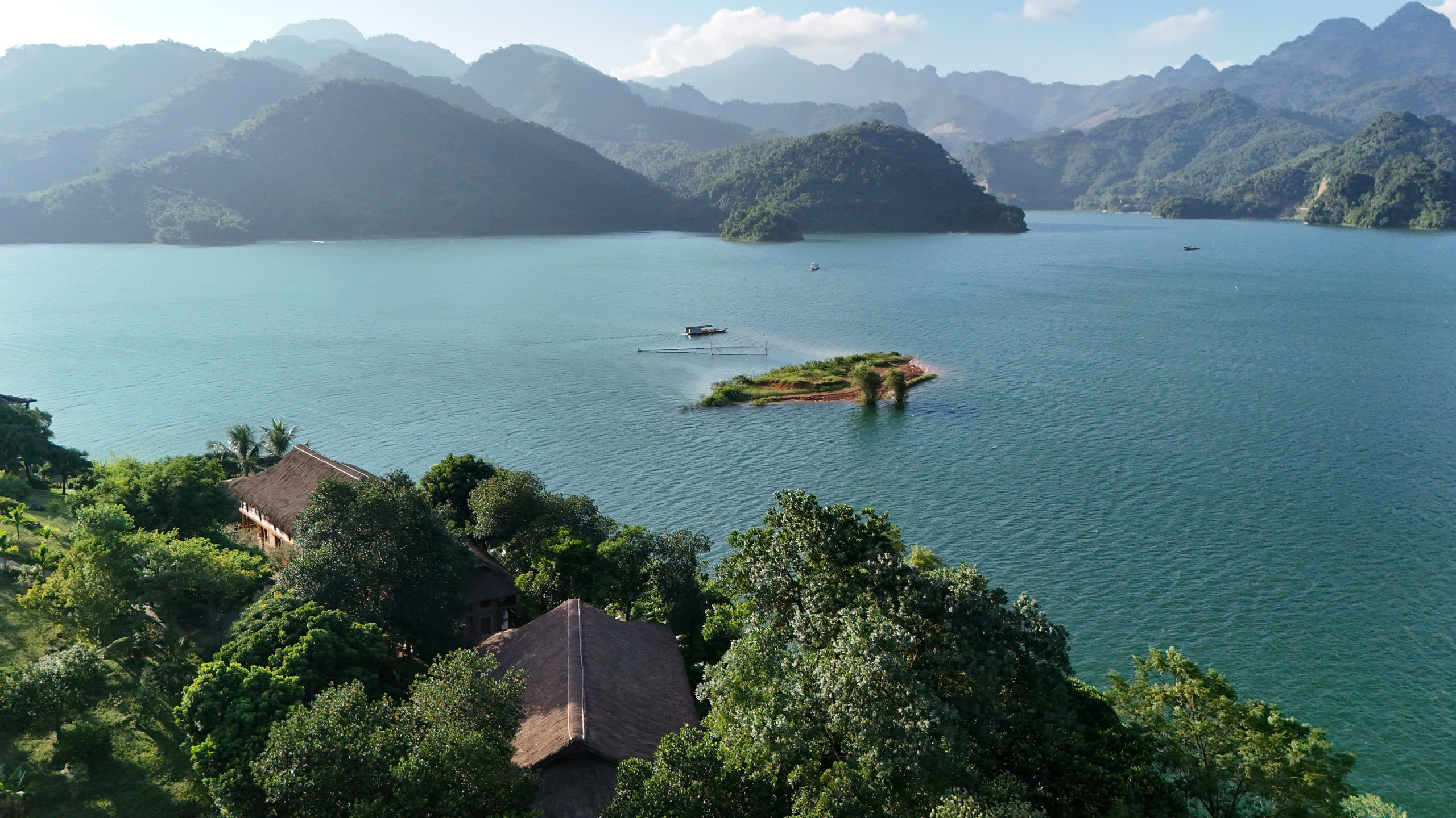 Hoa Binh Lake at sunset near Mai Chau Hideaway Lake Resort