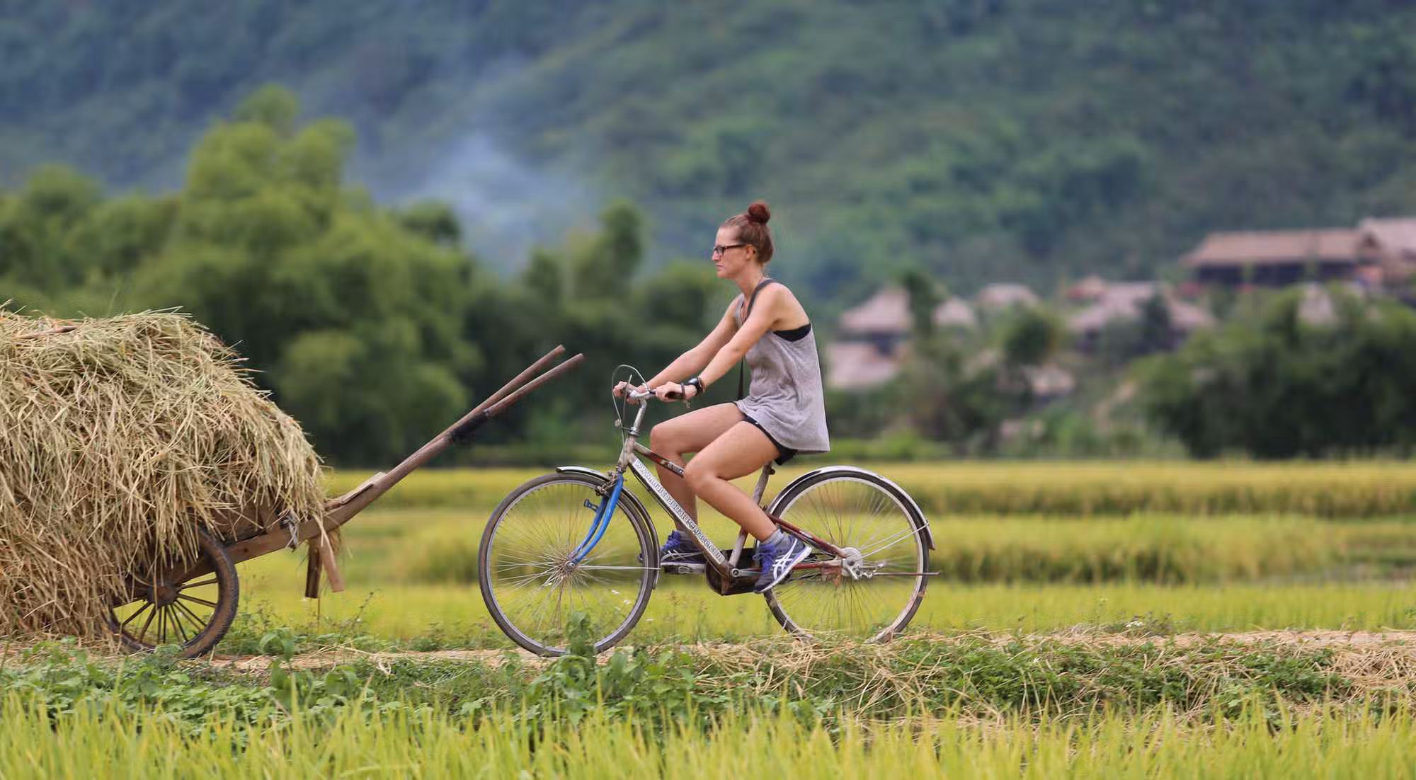 Cycling is the easiest way to combine a village visit with the wider scenery of Mai Chau valley (Source: Local Vietnam)