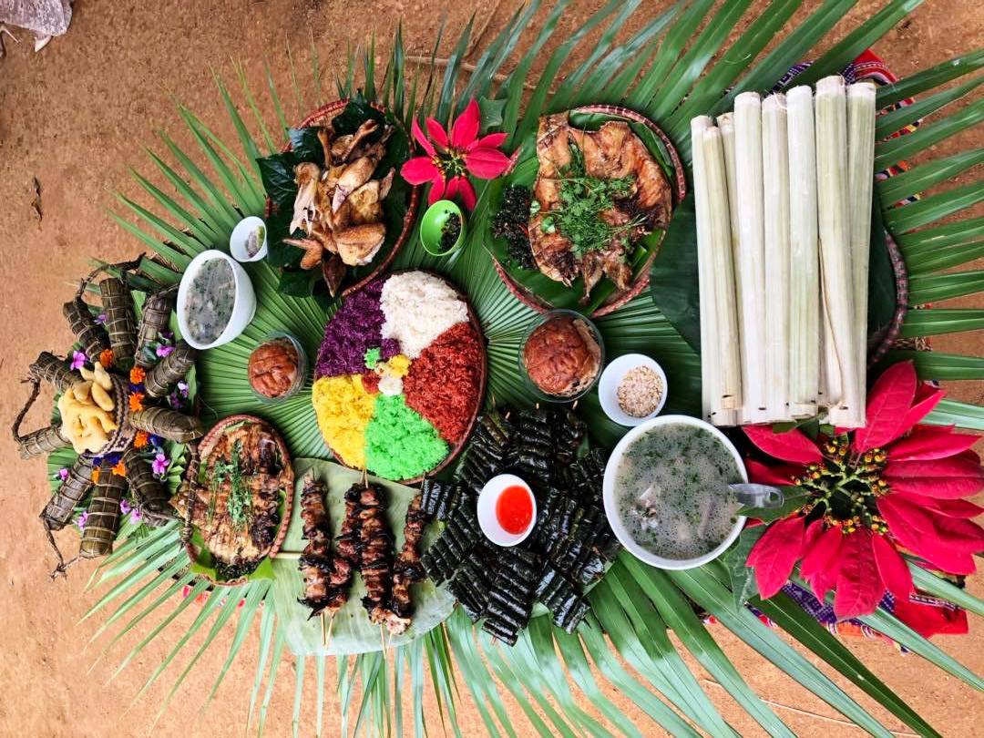 Grilled chicken, stream fish, and sticky rice laid out for lunch (Source: Collected) Grilled chicken, stream fish, and sticky rice laid out for lunch (Source: Collected)
